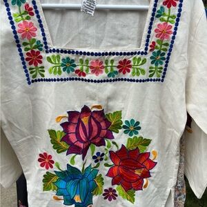 Pink and Red Embroidered Blouse with Intricate Floral Design